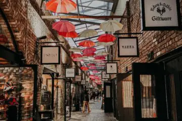 Camden market strip with umbrellas on the ceiling