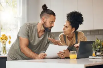 Debt Documents And Couple ArgueDebt Documents And Couple Argue